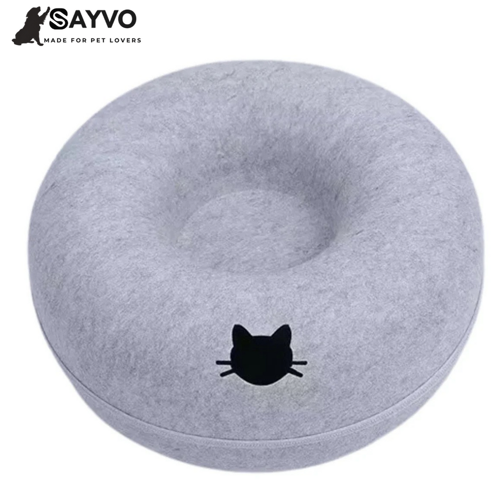 Light grey round felt cat tunnel bed with a cosy central nest and cat-shaped opening; graphic advertises 50% off and free delivery.