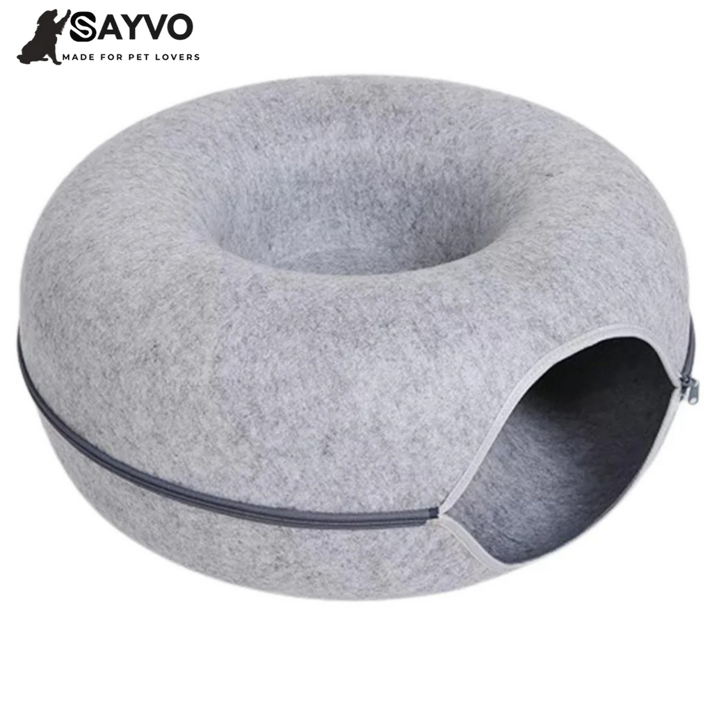 Light grey round cat tunnel bed with a circular entrance, central nest and zipper; graphic advertises 50% off and free delivery.